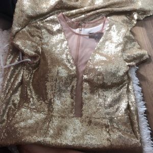 Gold sequin sheer cut out on front cocktail dress
